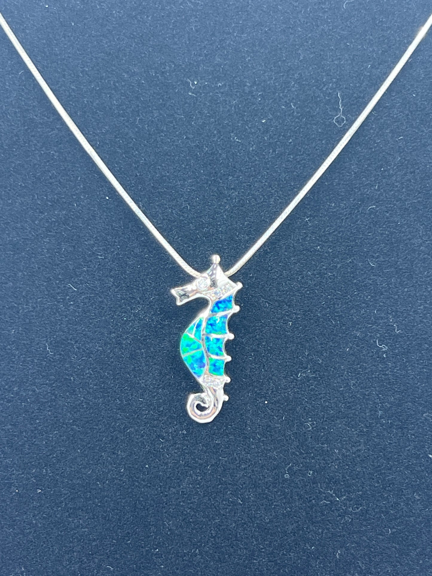 925 Sterling Silver Rhodium Plated Simulated Blue Opal and Cubic Zirconia Seahorse